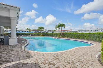 the swimming pool at the resort at longboat key club at The Falls of Portofino Apartment, Naples, FL, 34119